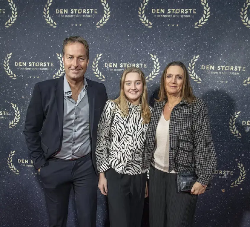 Vibeke Hjulmand attending event with her husband and daughter.