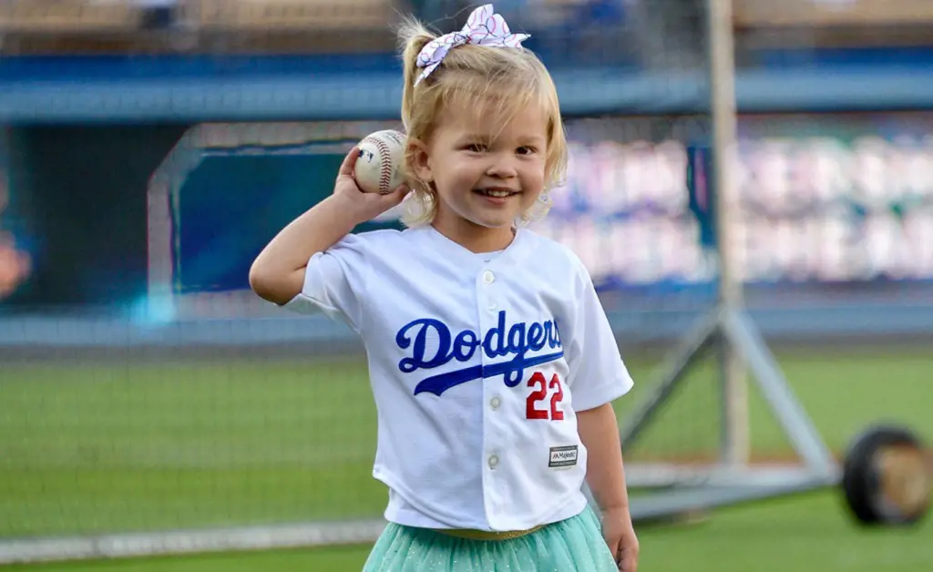 Clayton Kershaw's daughter Cali Ann throws out the first pitch at Dodger Stadium in 2017.