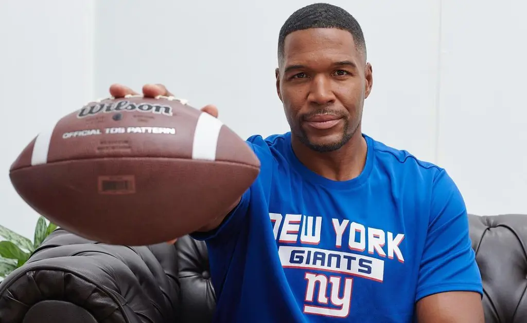 Michael Strahan is a former professional football player who plays as a defensive end for the New York Giants of the National Football League.