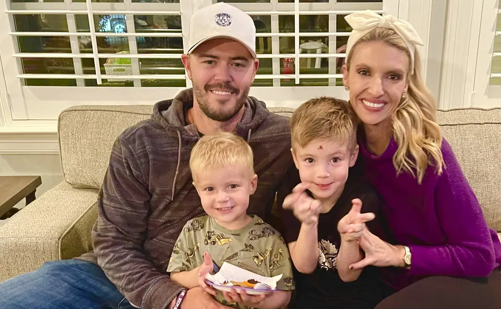 Garrett Riley with his wife and children.