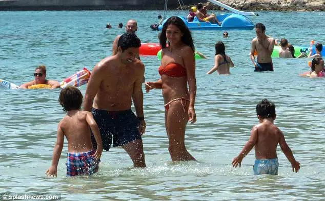 Gabriel spending time with his family on a beach