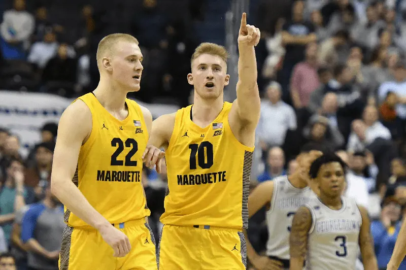 Sam Hauser during a College basketball game playing for the Marquette Golden Eagles
