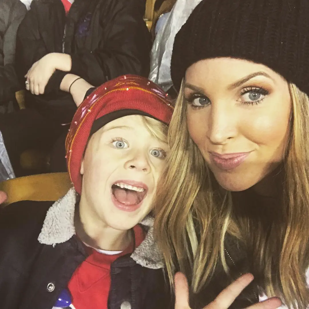 Elizabeth Smith with her son during Alex Smith's game