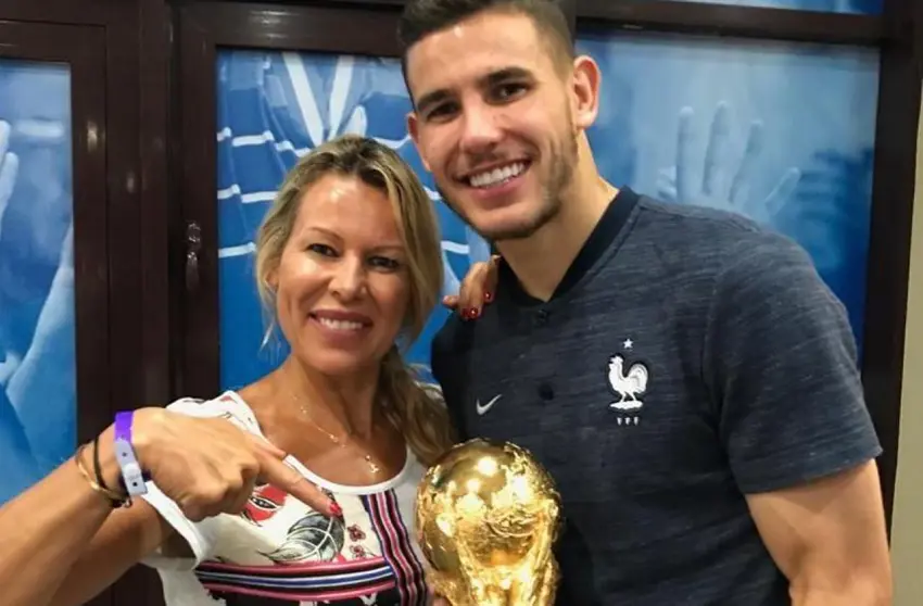 Laurence Py and her son Theo with the golden cup.