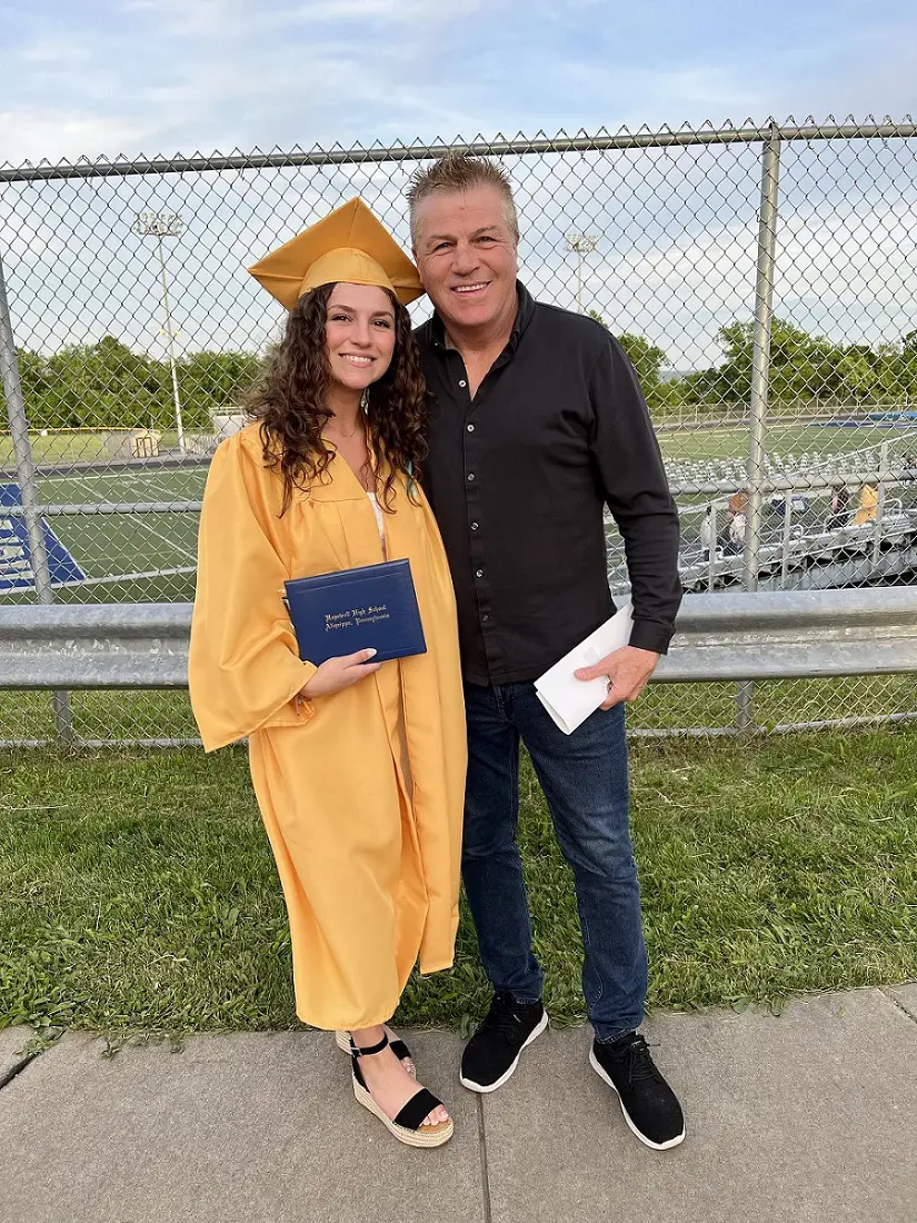 Phil with Maddie on her graduation day.