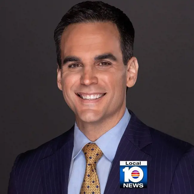 A professional portrait of Manso captured by Local News 10.