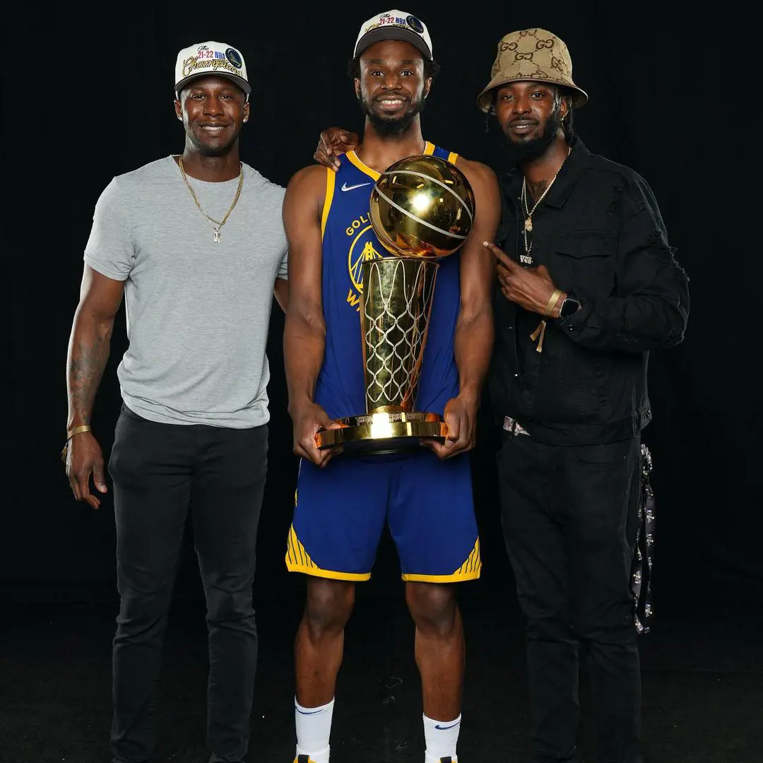 Mitchell(left) with Andrew(middle) and Nicholas(right) as Andrew won NBA championship in 2022.