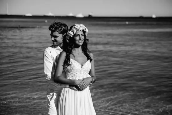 The black and white picture of the special day near the sea.