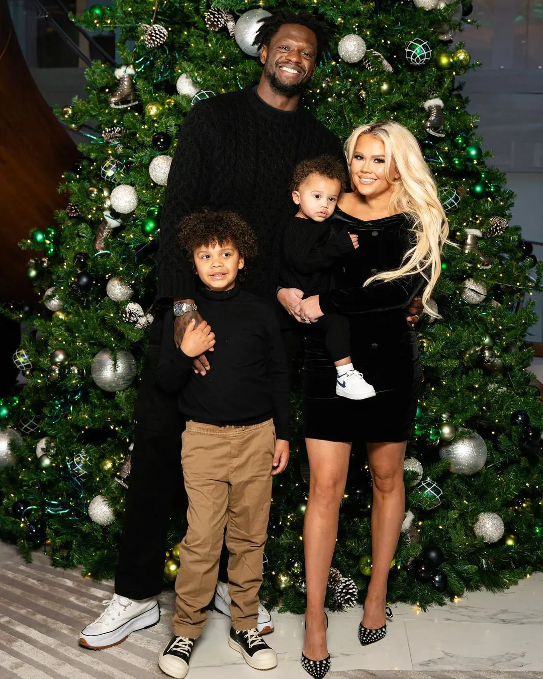 Julius and his wife Kendra celebrates Christmas with their two sons Kyden and Jayce in December 2022 in New York