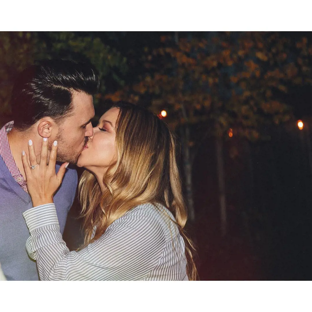 Adam and Michell kissing after she accepted the proposal in Gilroy, California in November 2016