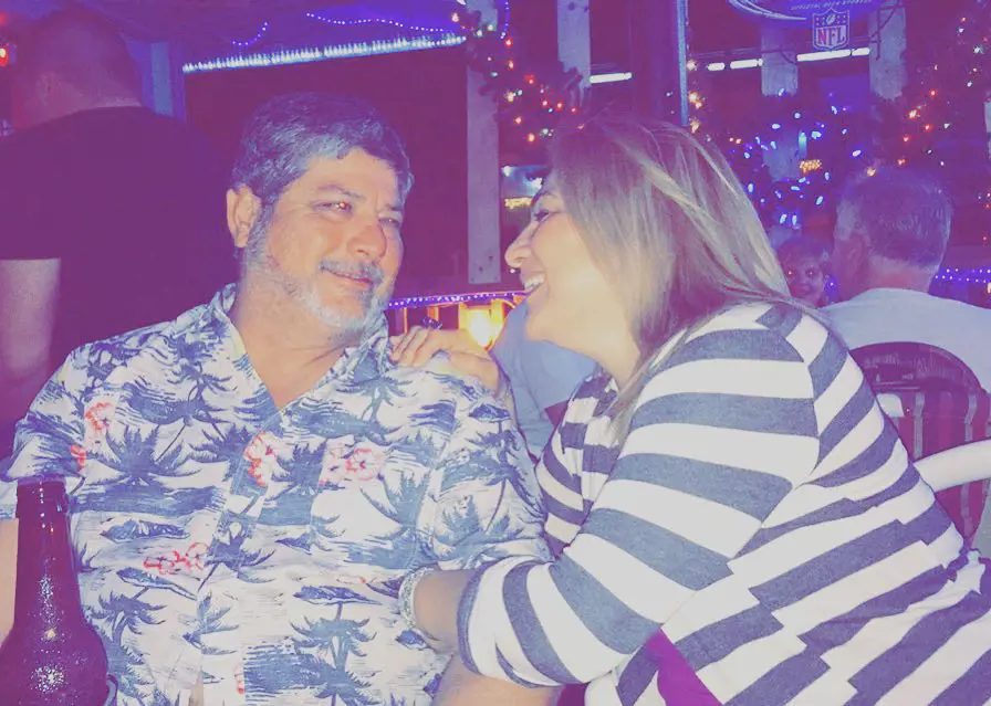 Ricky and Lucy shares a laugh during dinner in December 2015.