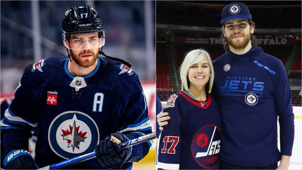 The Winnipeg Jets' ice hockey center Adam clicks a photo with Elaine on the rink.