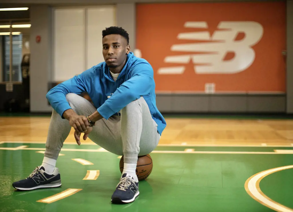 Aaron signed multi-year footwear endorsement deal with New Balance in 2021.