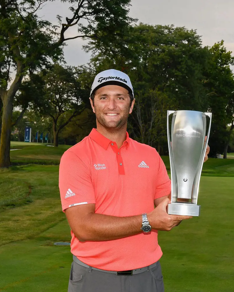 Jon holding the BMW Championship trophy on August 31, 2020. 