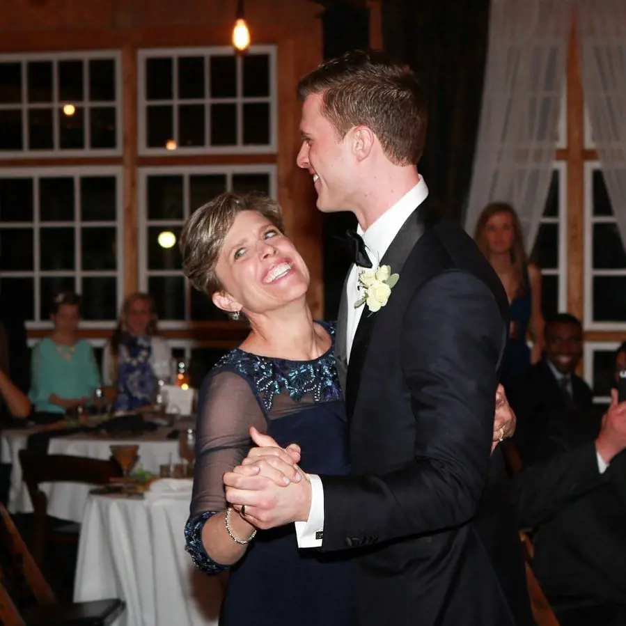 Butker and his mother, Elizabeth, on the dance floor during his wedding in 2018
