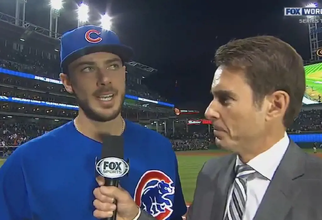 Tom interviewing Chicago Cubs player after a baseball match in 2016