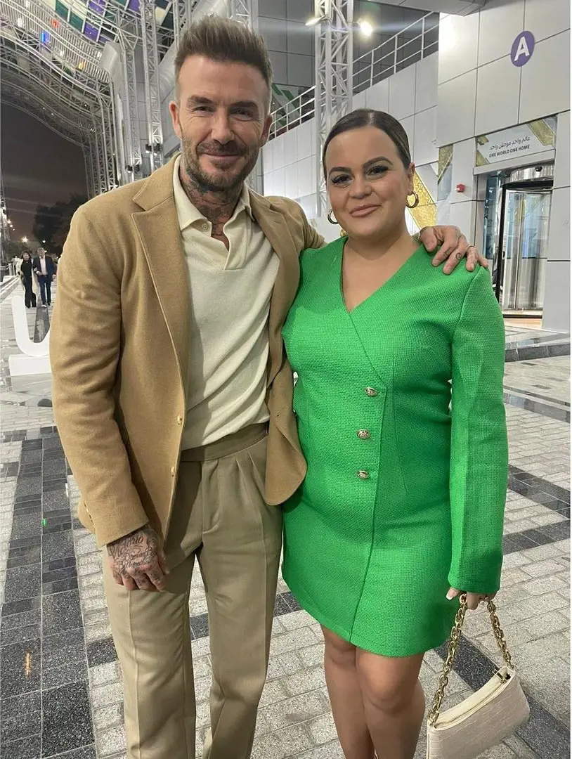 Ellis snapping with former Manchester United football player David Beckham during World Cup 2022 in Oatar