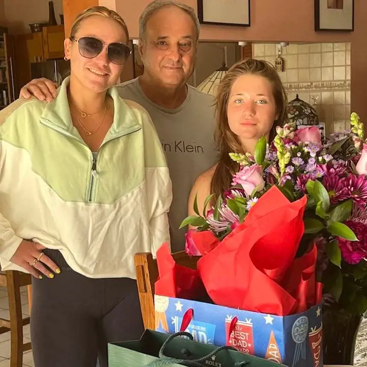 Alexander Kenin with his two daughters on Father's Day