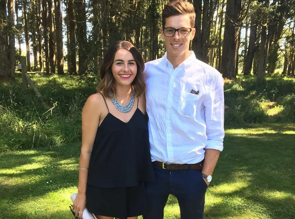 Mitchell Santner with his partner, Caitlin attending a wedding in January 2017