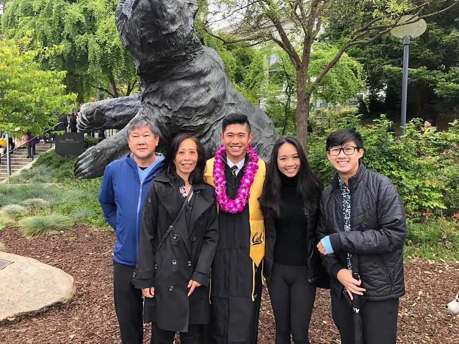 Morikawa with his family during his graduation from Haas School of Business in May 2019