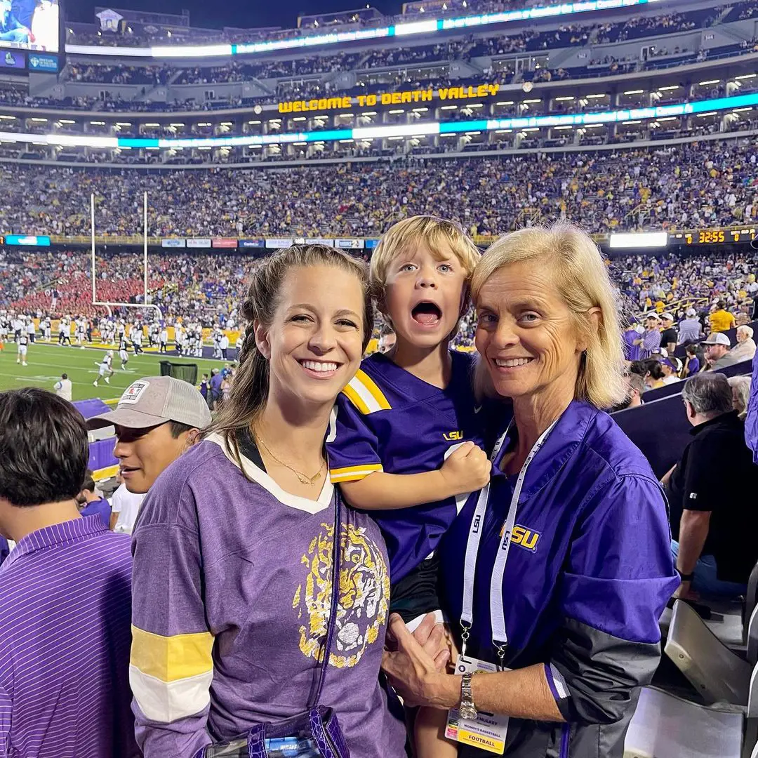Kim with Makenzie and Kannon as they attend a football game at Tiger Stadium in December 2021