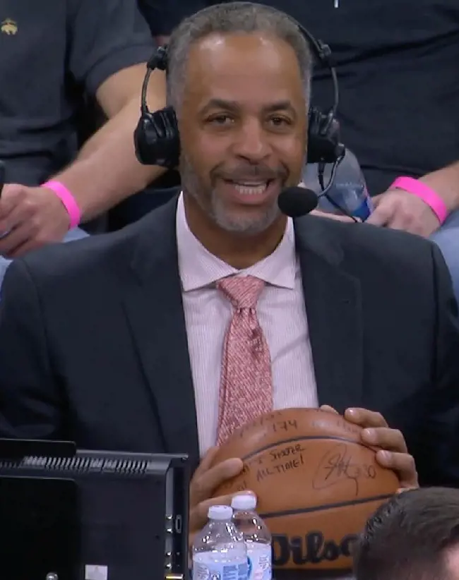 Dell with Steph's record-breaking game ball on December 16, 2021.