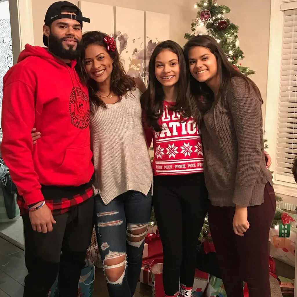 Nick celebrating Christmas with his stepsisters in April 2020