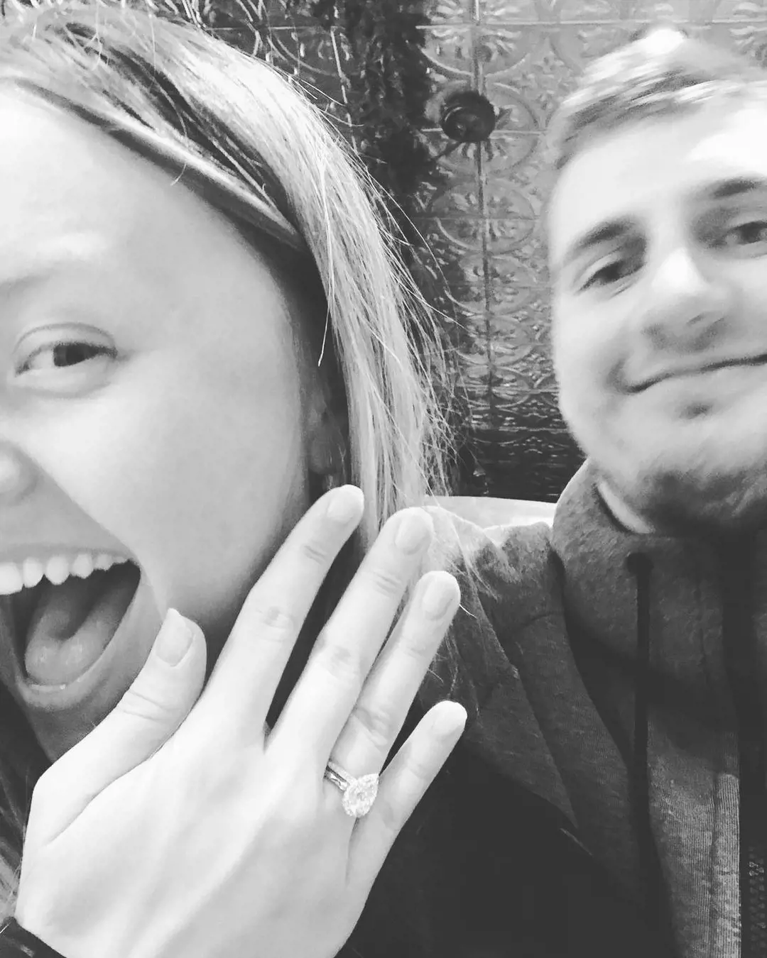 Jokic and his gf flaunting her rings.