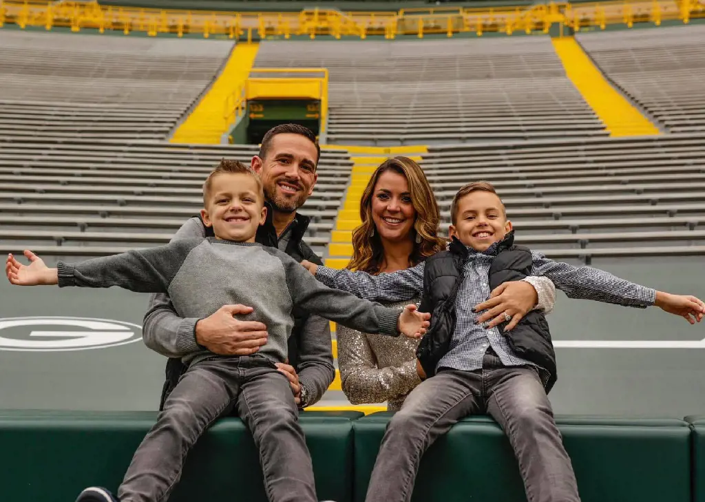 Matt with his wife and two boys in a stadium, a few days before Christmas in 2020