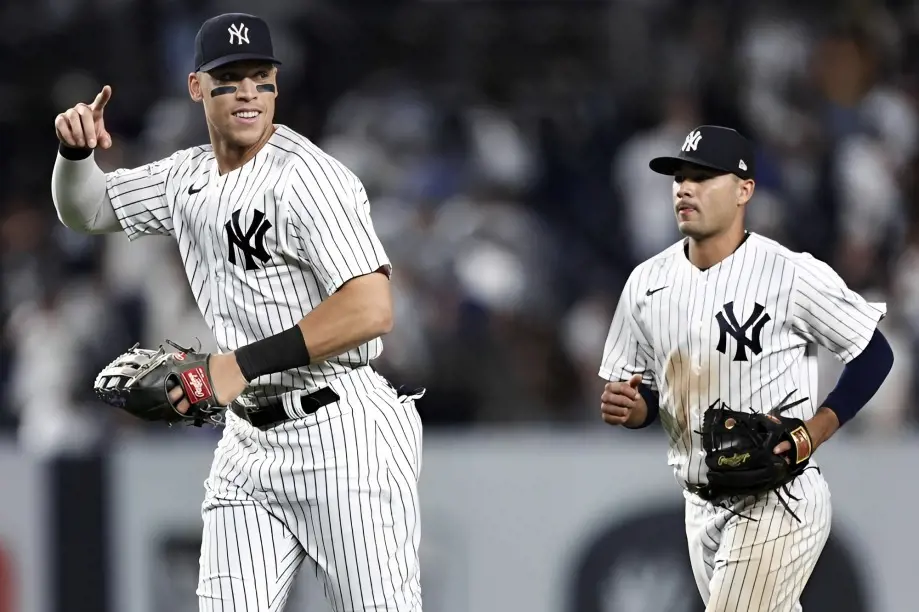 The 2022 AL MVP Aaron Judge (left) during a game