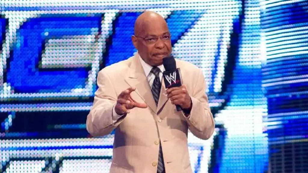 Teddy during his time working for WWE  serving as an on-screen authority figure. 