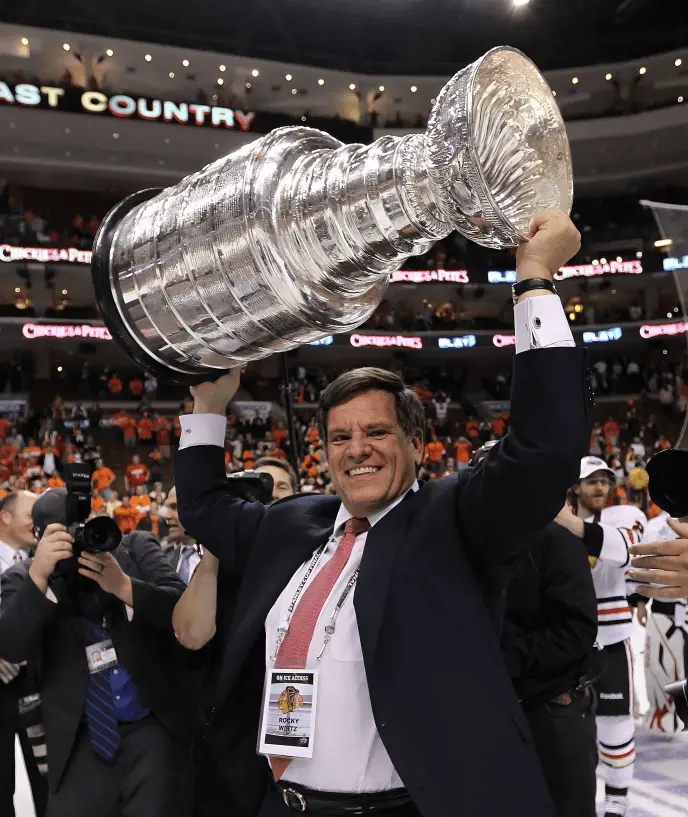 William Rockwell lifting the Stanley Cup in 2010. (Photo by Bruce Bennett)