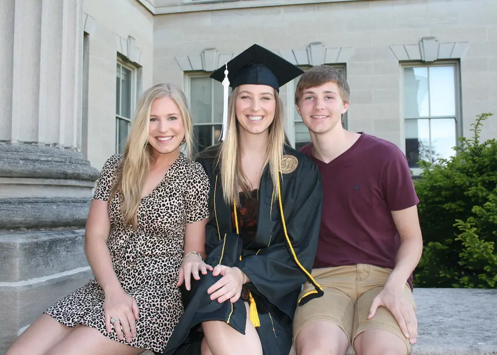 (Left to Right) Emma, Lisa, and David during Lisa's graduation ceremony in July 2020