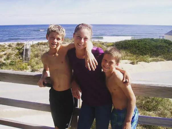 Tommy (left) enjoying time with his sister Jessie (middle) and brother Dylan (right) at Kitty Hawk, North Carolina.