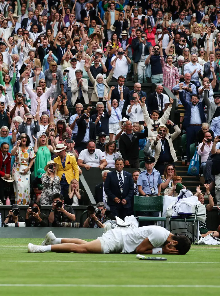 Fans react to the defending US Open champion Carlos Alcaraz after his Wimbledon Final win in 2023