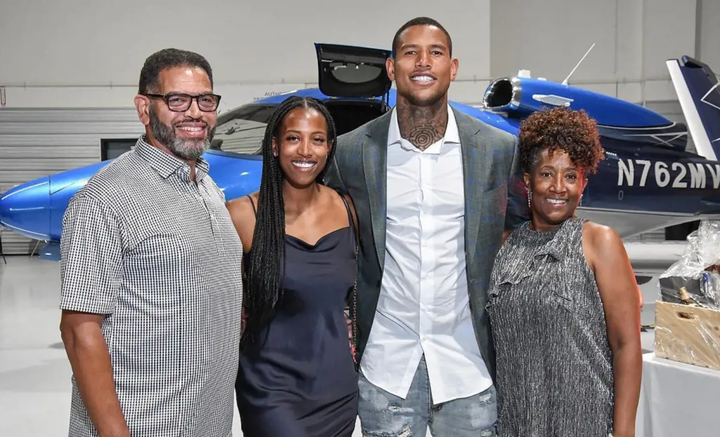 From left Dorian, Deanne, Darren and Charlena pictured together in 2022 as he signed three years contract with Raiders. 