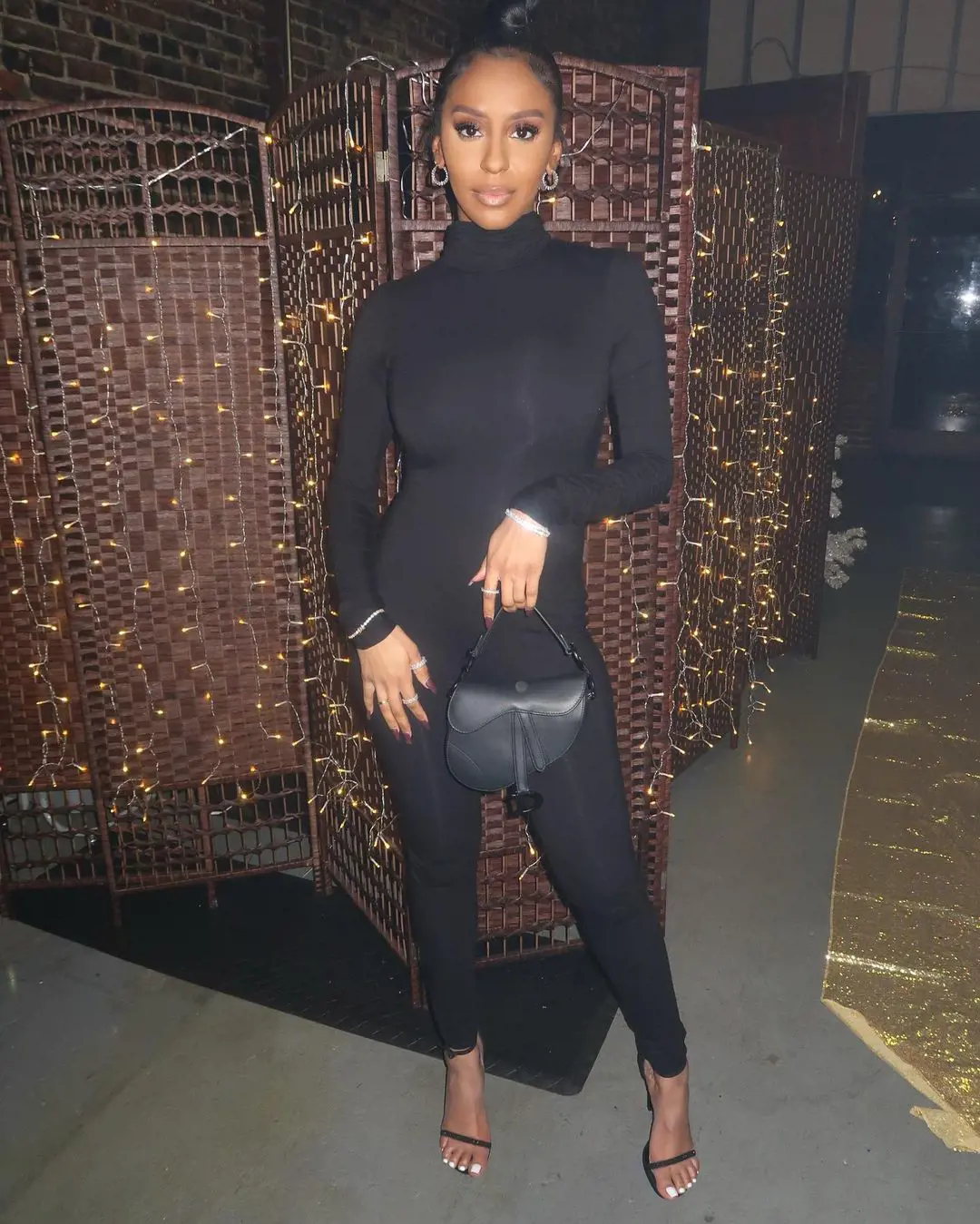 LaTanfernee looking stunning in a black outfit. 