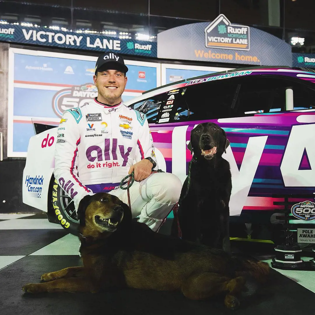 Alex Bowman with his canines at Daytona International Speedway in February 2023