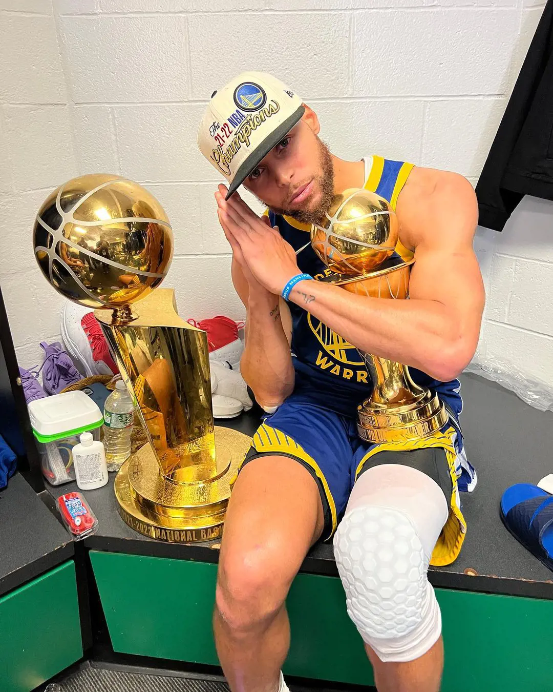 Stephen Curry with the NBA championship award. 