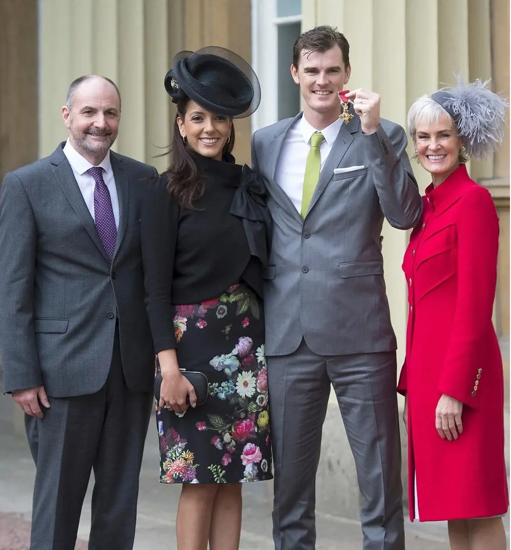 Jamie Murray with his wife, mom and dad at Buckingham Palace in London after he received his Officer of the Order of the British Empire (OBE).