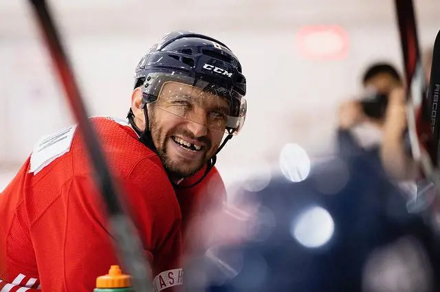 The Caps left winger puts on a grin smile after being back on the ice in September 2018.