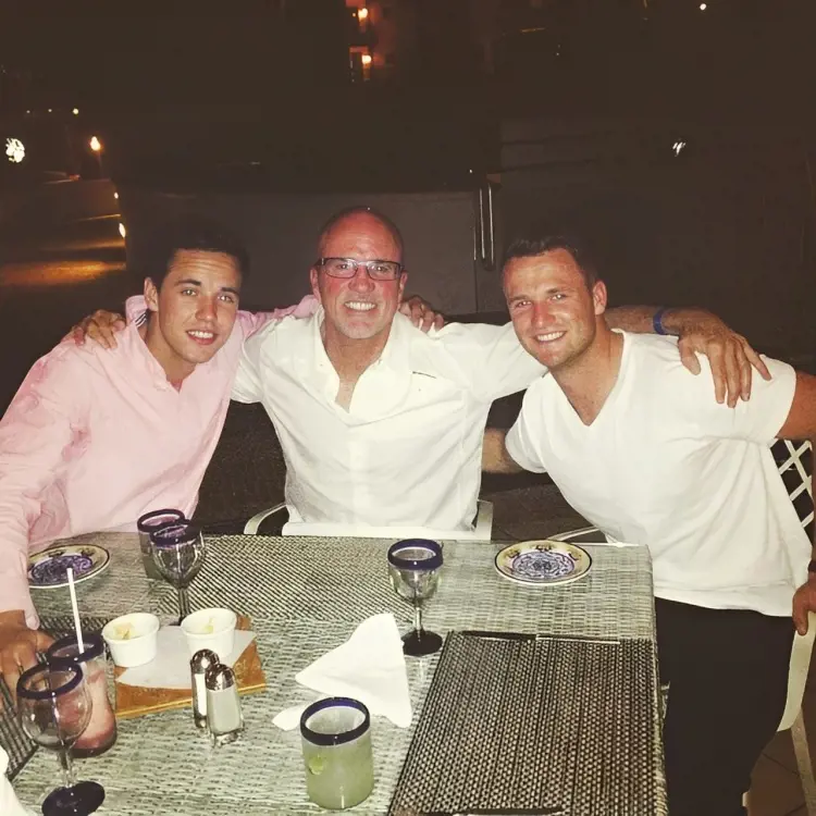 Wyndham(right) with Randall and Brendan celebrating Christmas at Hotel Finisterra on October 26, 2014.