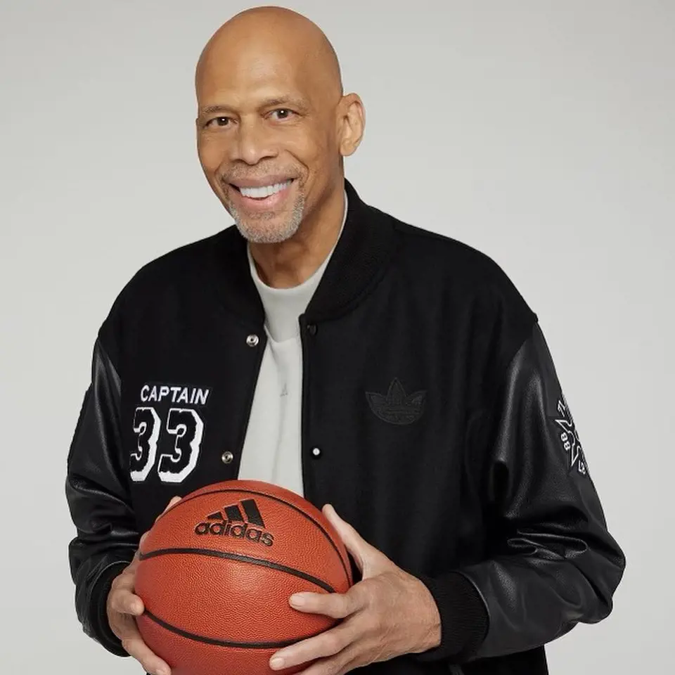 Kareem wearing limited Evolution of Excellence jacket by adidas and Jeff Hamilton made exclusively for VIP members of the club.