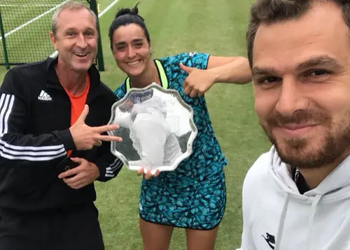 Karim clicks a selfie with Ons as she holds the Manchester Trophy on June 17, 2018