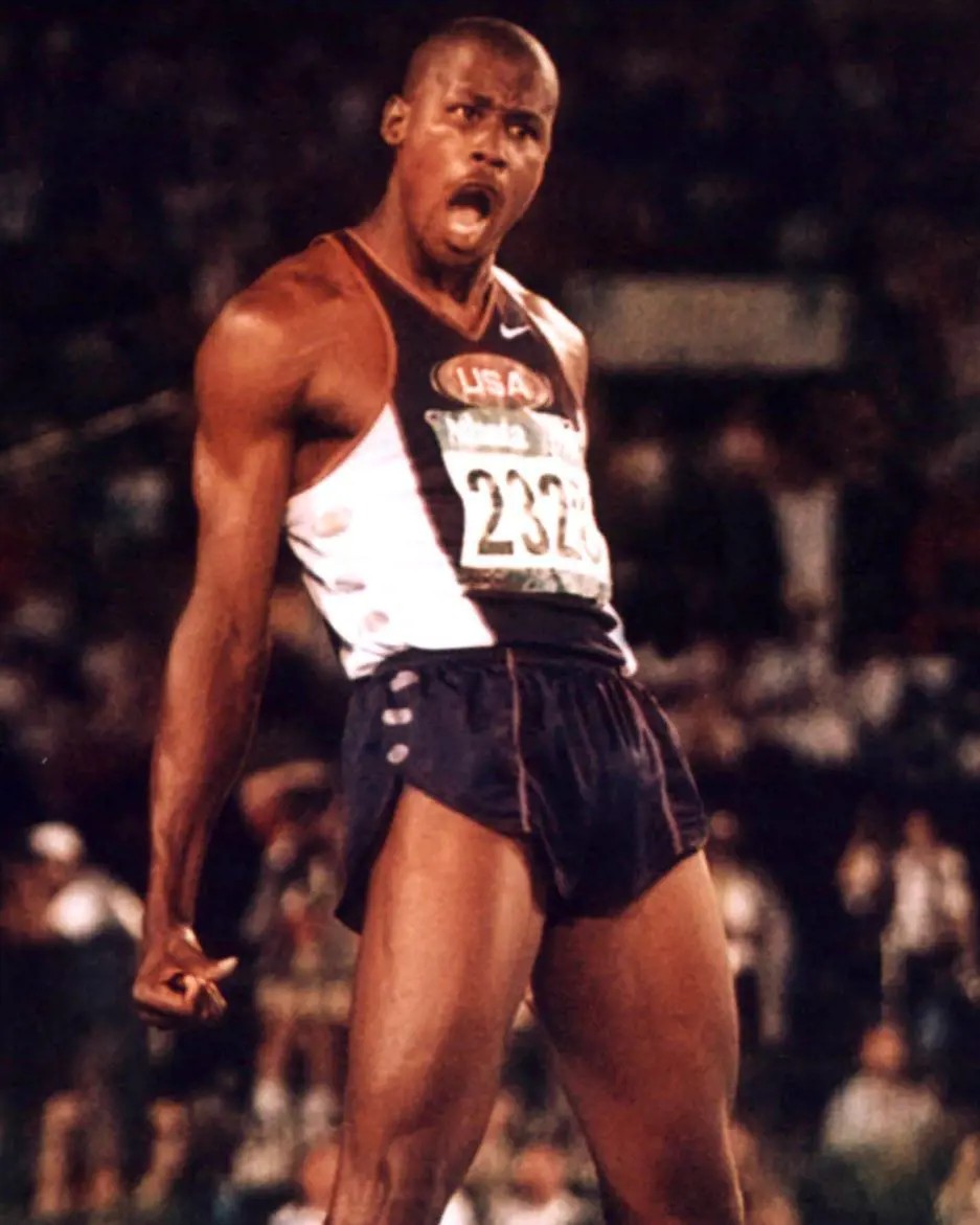 Charles Austin celebrates as he get over the bar winning the gold medal in the Olympics for his nation USA