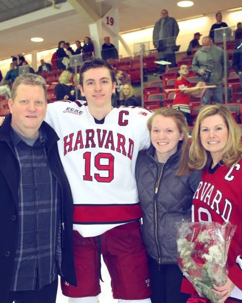 Vesey (far left) with his son Jimmy (second from left) at the latter's varsity game in 2016.
