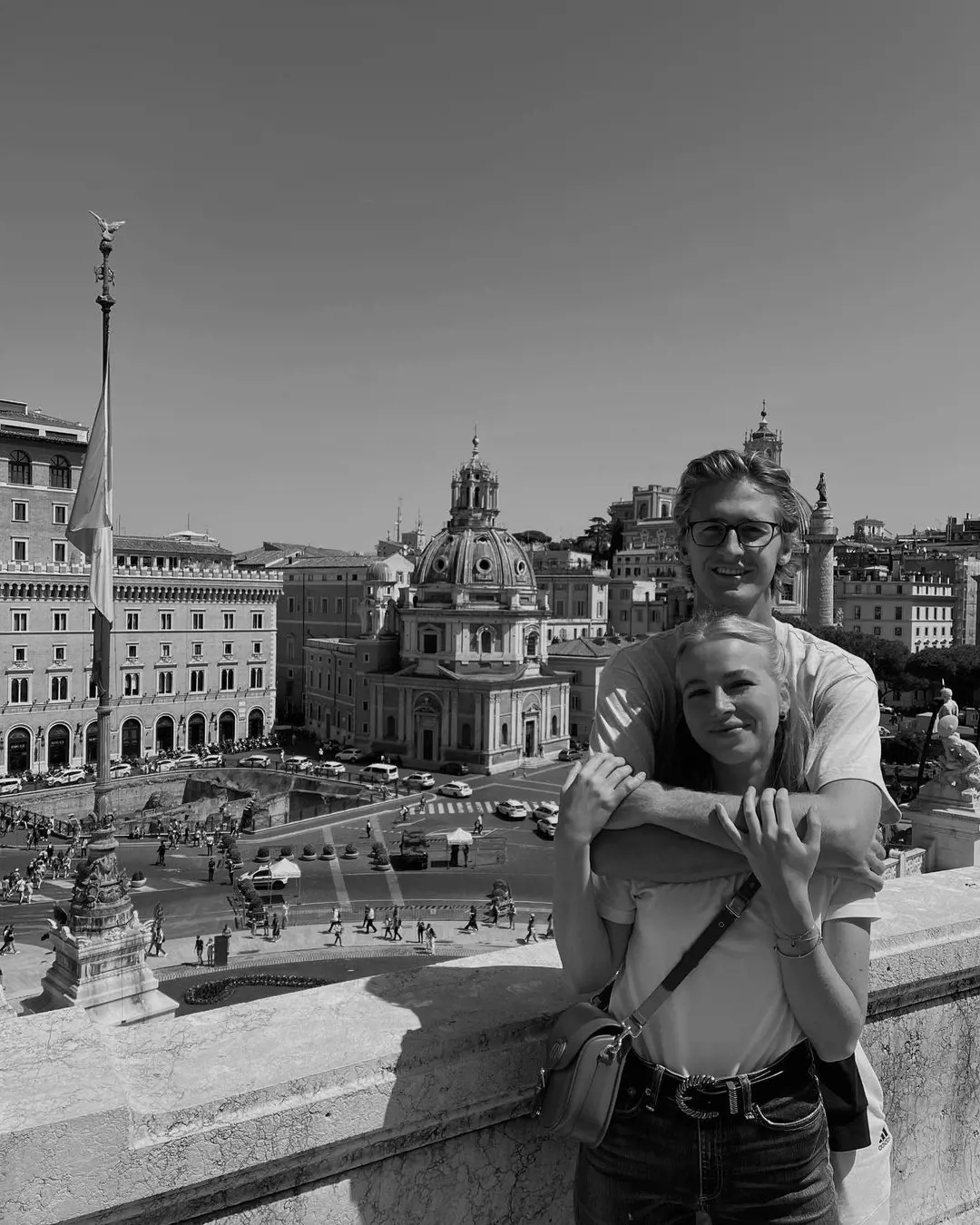 Cute couple Sebastian and Ivana explores the ancient city of Rome, Italy in Mat 2022 as they pose in front of a famous catholic church Santa Marie di Loreto