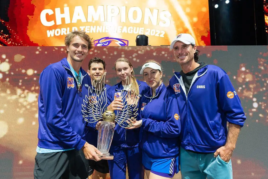 Elena with her team partner (from left), Alex, Anastasia and Christian, after winning the World Tennis League in December 2022 at Coca Cola Arena, Dubai