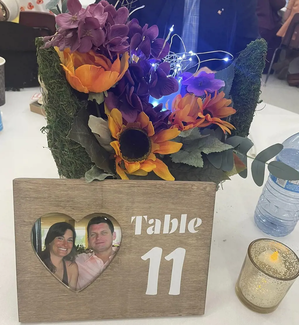 Vanessa and Jeff Mailloux's reserved table at their relative's wedding in October 2022.