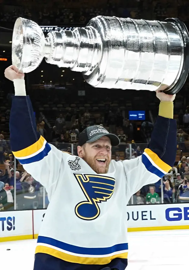 Ryan O'Reilly runs around with the historic 2019 trophy.
